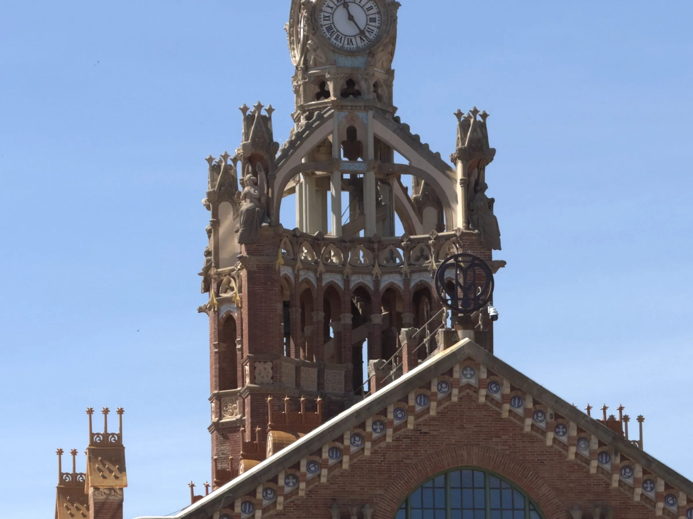 A mosaic tower and gold dome at the Hospital de Sant Pau, Barcelona