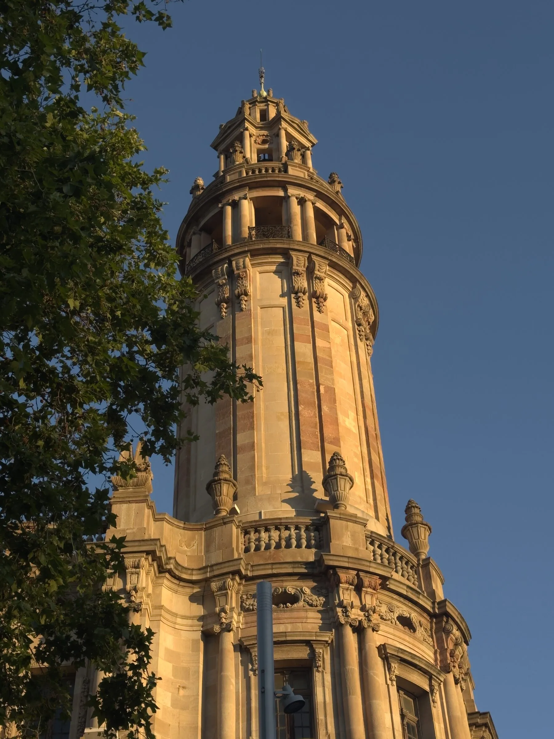 A mosaic tower and gold dome at the Hospital de Sant Pau, Barcelona