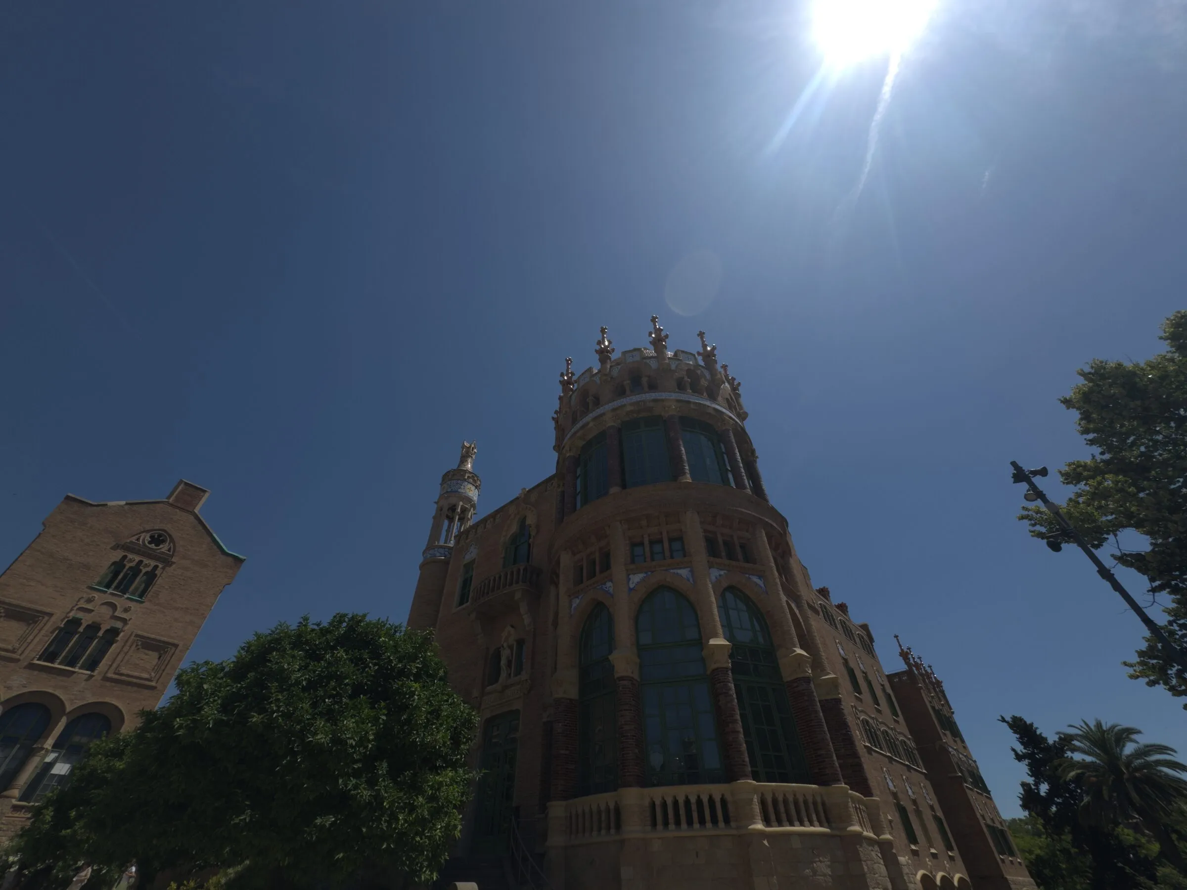 A mosaic tower and gold dome at the Hospital de Sant Pau, Barcelona