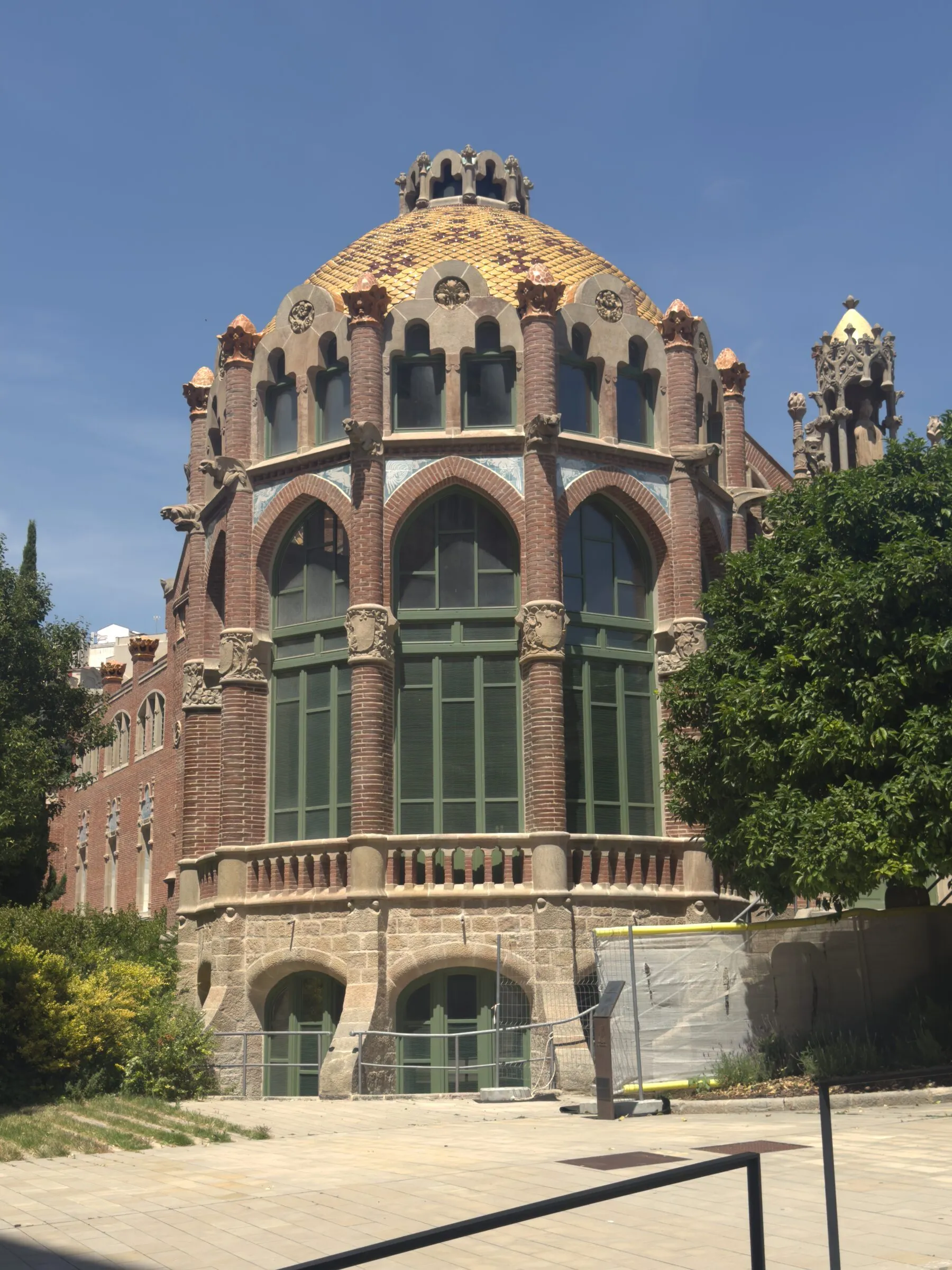 A mosaic tower and gold dome at the Hospital de Sant Pau, Barcelona