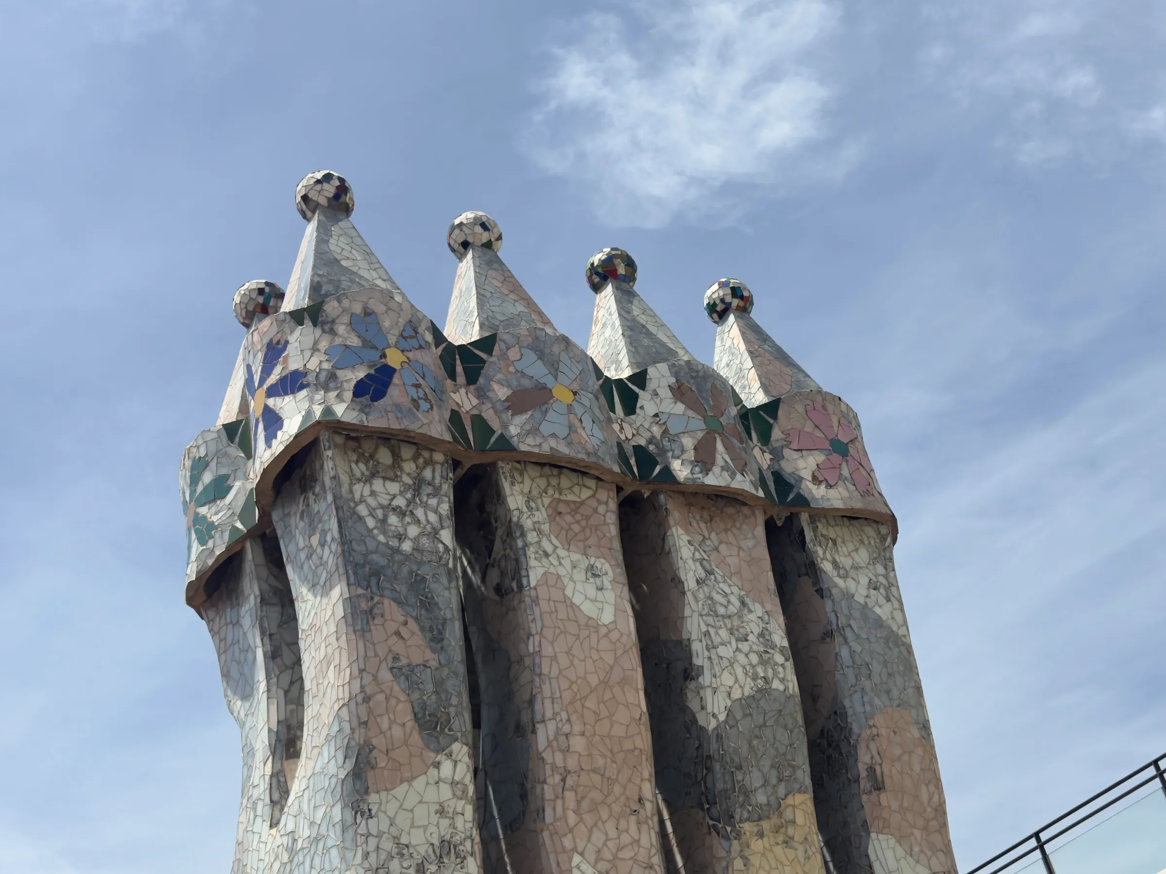 Colorful ceramic chimney stacks on the Casa Batlló rooftop.